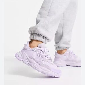 Adidas Ozweego purple tint sneakers.